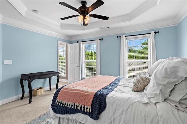 2343 Limehurst Dr NE, Atlanta, GA 30319 - bedroom featuring a tray ceiling, crown molding, light carpet, and a ceiling fan