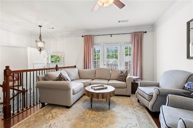 2343 Limehurst Dr NE, Atlanta, GA 30319 - living room with wood finished floors, crown molding, and a ceiling fan