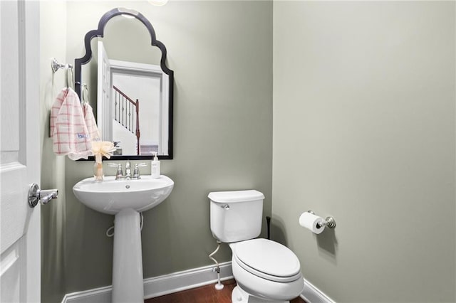 2343 Limehurst Dr NE, Atlanta, GA 30319 - half bath with baseboards and wood finished floors