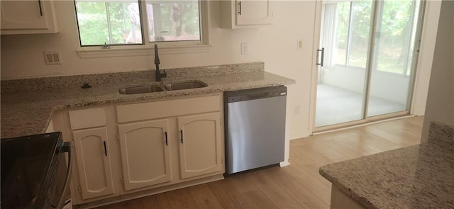 991 Park Creek Cir, Lawrenceville, GA 30044 - kitchen featuring dishwasher, a sink, light wood finished floors, white cabinets, and light stone counters