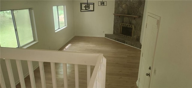991 Park Creek Cir, Lawrenceville, GA 30044 - unfurnished living room with wood finished floors, a fireplace, and baseboards
