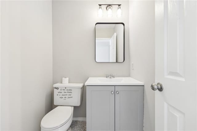half bath with toilet and vanity