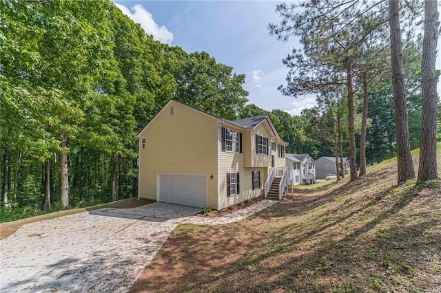 view of home's exterior featuring a garage