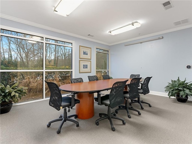 carpeted home office with visible vents, baseboards, and ornamental molding