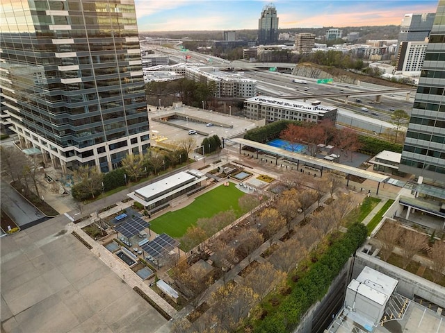 birds eye view of property with a view of city