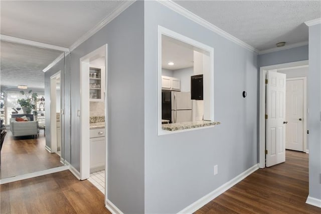 303 Gettysburg Pl, Atlanta, GA 30350 - hallway featuring dark wood-style flooring, ornamental molding, and baseboards