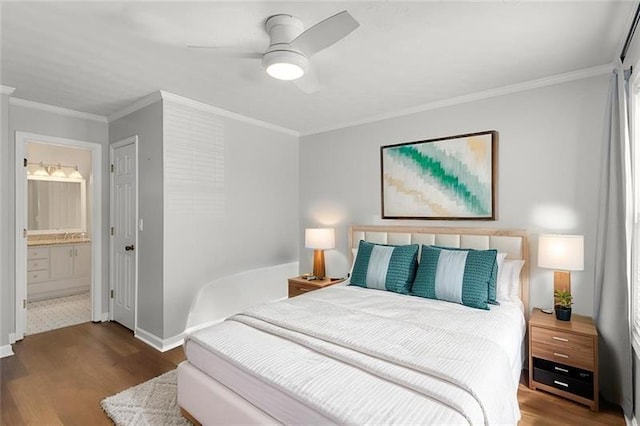 303 Gettysburg Pl, Atlanta, GA 30350 - bedroom with wood finished floors, crown molding, baseboards, ensuite bathroom, and a ceiling fan