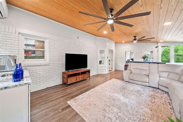 3415 Trickum Rd, Woodstock, GA 30188 - living area with wooden ceiling, a ceiling fan, brick wall, wood finished floors, and an AC wall unit