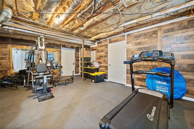 3415 Trickum Rd, Woodstock, GA 30188 - workout room featuring wooden walls