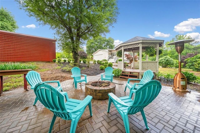 3415 Trickum Rd, Woodstock, GA 30188 - view of patio with a gazebo and a fire pit