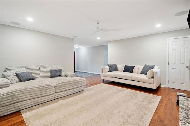 3415 Trickum Rd, Woodstock, GA 30188 - living room with ceiling fan, ornamental molding, wood finished floors, recessed lighting, and baseboards