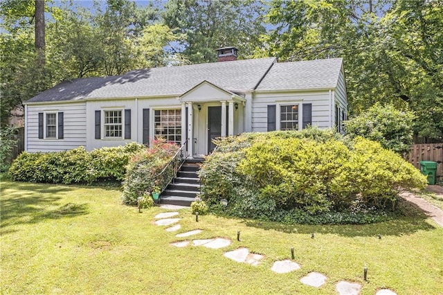 1908 E Roxboro Rd NE, Atlanta, GA 30324 - view of front of home featuring a chimney and a shingled roof