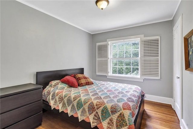 1908 E Roxboro Rd NE, Atlanta, GA 30324 - bedroom featuring wood finished floors and crown molding