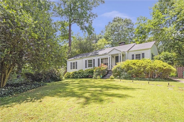 1908 E Roxboro Rd NE, Atlanta, GA 30324 - view of front of property featuring a front yard and a chimney
