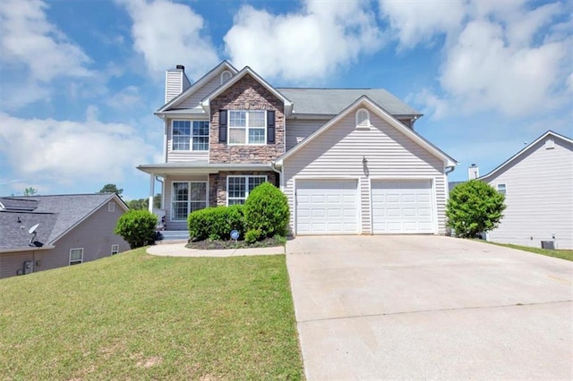 4965 Buckeye Pl, Atlanta, GA 30349 - view of front of property featuring an attached garage, stone siding, a chimney, a front lawn, and driveway