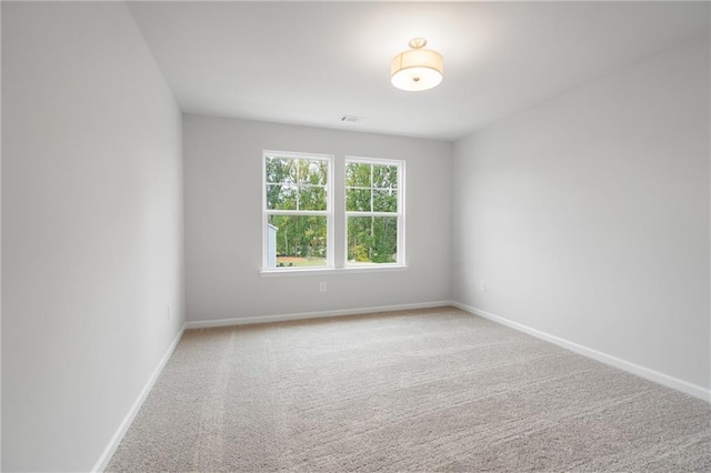 702 Smokey Quartz Way, Kennesaw, GA 30144 - carpeted spare room with baseboards