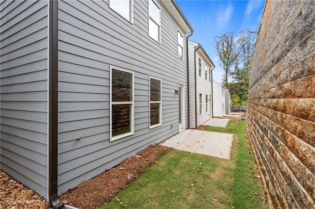 702 Smokey Quartz Way, Kennesaw, GA 30144 - view of property exterior with a patio area