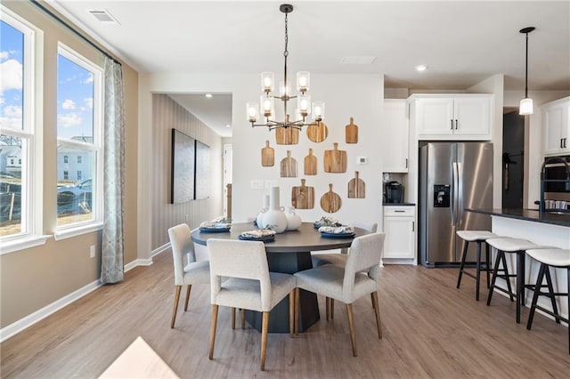 702 Smokey Quartz Way, Kennesaw, GA 30144 - dining area featuring a chandelier, light wood-type flooring, healthy amount of natural light, baseboards, and recessed lighting