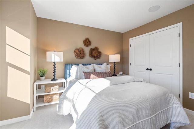702 Smokey Quartz Way, Kennesaw, GA 30144 - bedroom with baseboards, carpet, and a closet