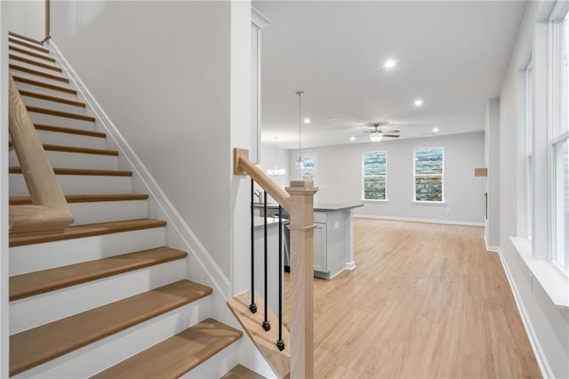 702 Smokey Quartz Way, Kennesaw, GA 30144 - staircase with wood finished floors, recessed lighting, ceiling fan, and baseboards