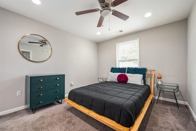 bedroom with ceiling fan and carpet flooring