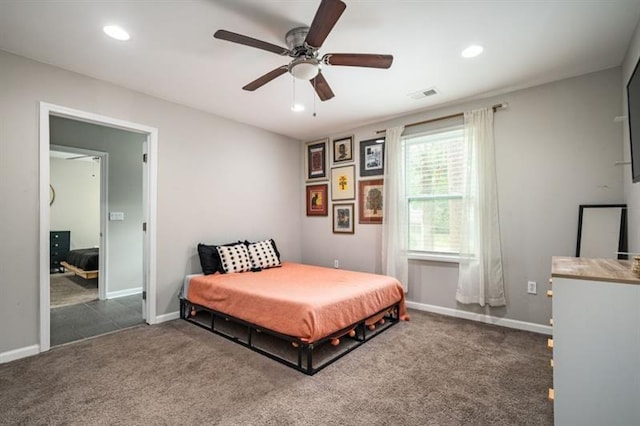 bedroom with dark carpet and ceiling fan