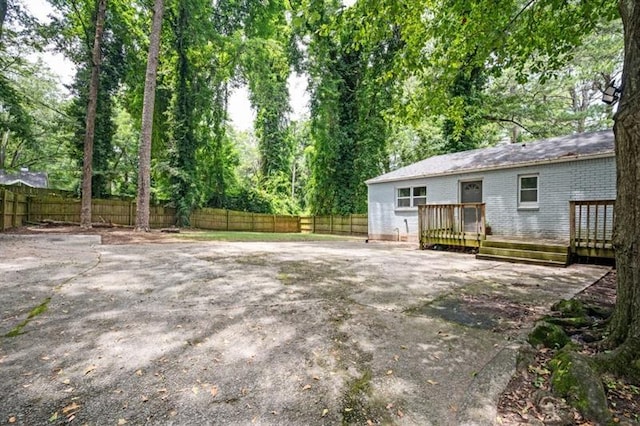 view of yard with a deck