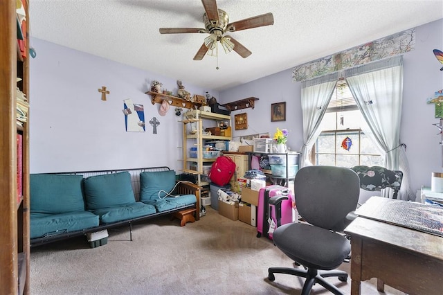 office space with a ceiling fan, a textured ceiling, and carpet floors