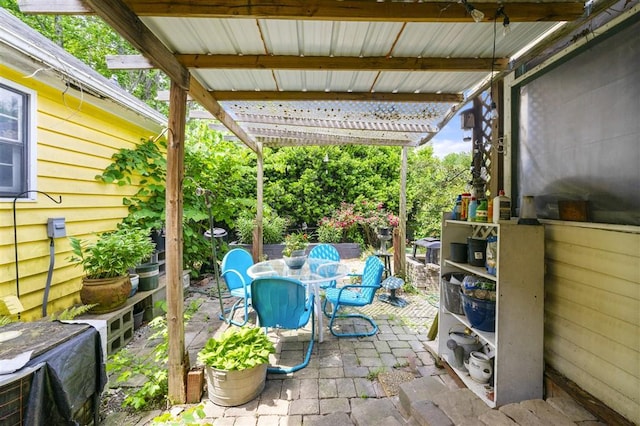 view of patio with outdoor dining area