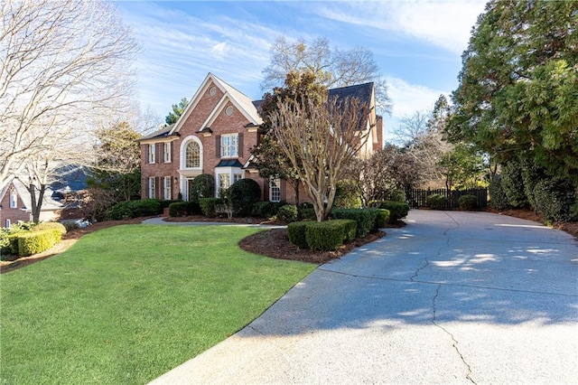 front facade with a front lawn