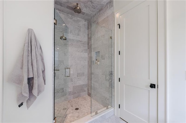 full bathroom featuring a stall shower