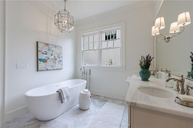 full bathroom with a sink, an inviting chandelier, crown molding, double vanity, and a soaking tub