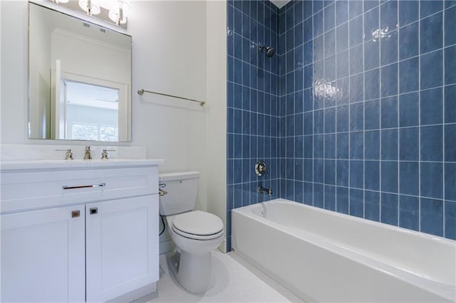 bathroom featuring tile patterned flooring, tub / shower combination, toilet, and vanity