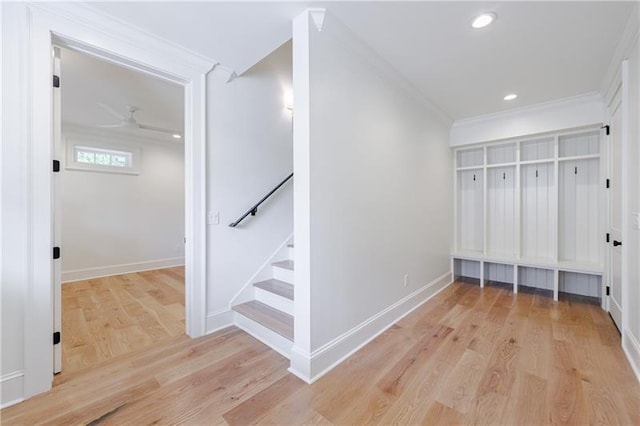 mudroom with recessed lighting, baseboards, light wood-type flooring, and ornamental molding