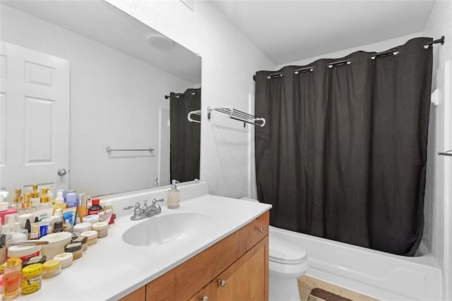 full bathroom with shower / bathtub combination with curtain, vanity, and toilet