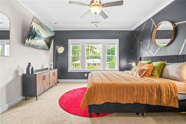 bedroom with light colored carpet, baseboards, crown molding, and a ceiling fan