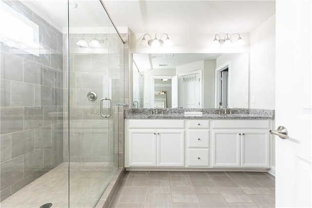 3133 Quinn Pl, Atlanta, GA 30341 - bathroom featuring double vanity, a shower stall, and tile patterned flooring