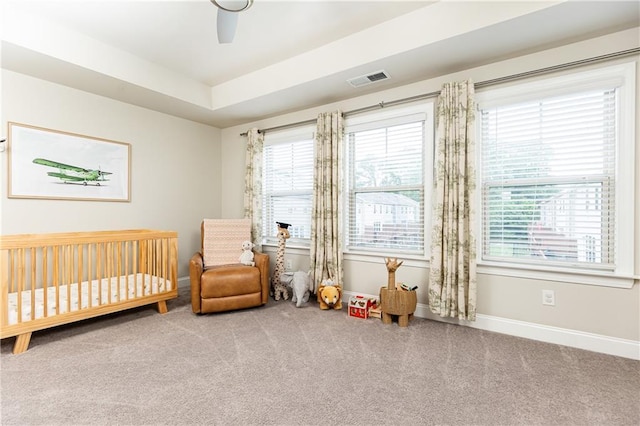 3133 Quinn Pl, Atlanta, GA 30341 - carpeted bedroom with baseboards, a nursery area, and a ceiling fan