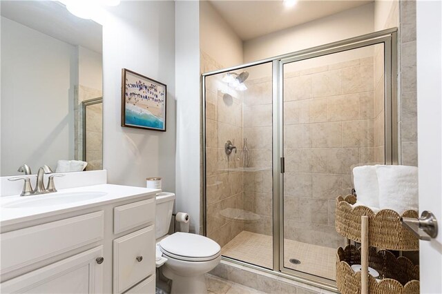 3133 Quinn Pl, Atlanta, GA 30341 - full bathroom featuring toilet, vanity, a stall shower, and tile patterned floors