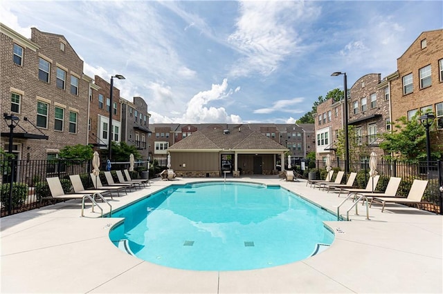 3133 Quinn Pl, Atlanta, GA 30341 - community pool featuring a patio area and a residential view