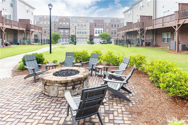 3133 Quinn Pl, Atlanta, GA 30341 - view of patio / terrace with a fire pit, a residential view, and central AC