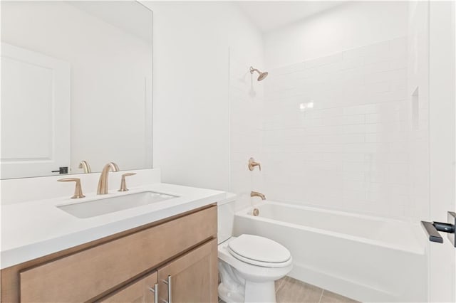 bathroom with vanity and a tub