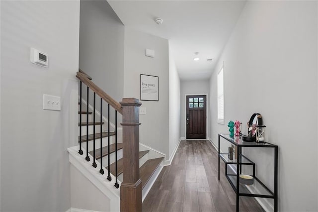 entrance foyer with dark hardwood / wood-style floors