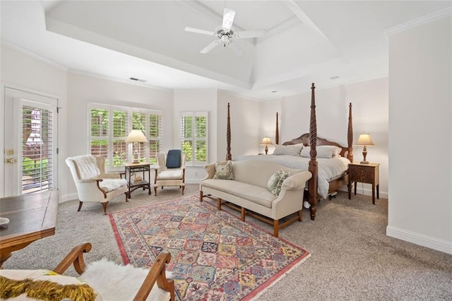 carpeted bedroom featuring baseboards, access to exterior, ornamental molding, and a raised ceiling