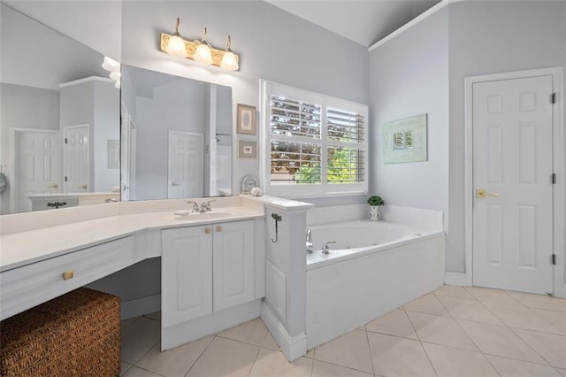 full bathroom featuring tile patterned flooring, a bath, and vanity