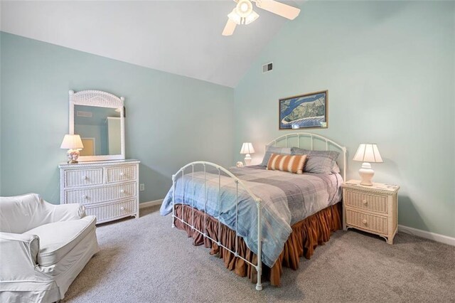 washroom with laundry area, baseboards, light tile patterned floors, and washing machine and clothes dryer