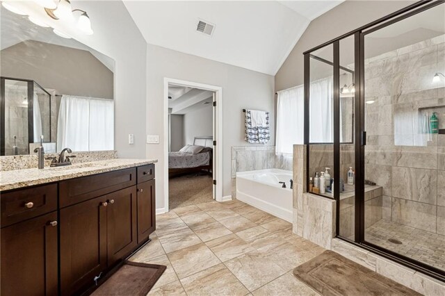 bathroom with vanity, plus walk in shower, and vaulted ceiling