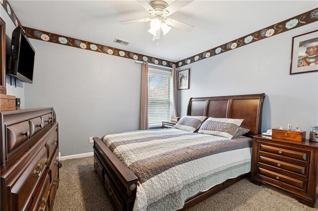 carpeted bedroom featuring ceiling fan