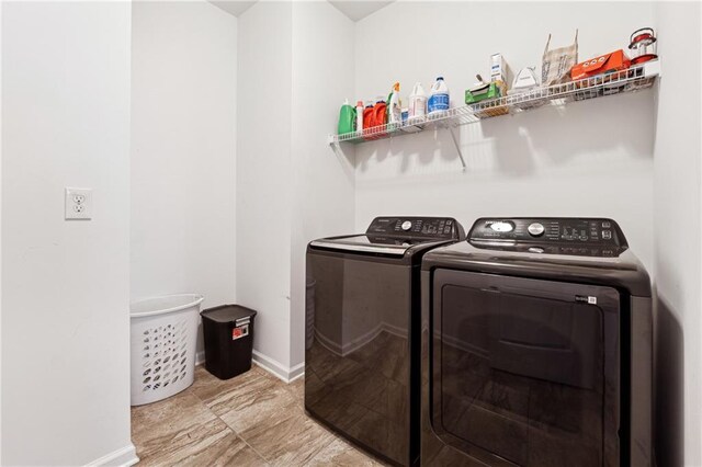 laundry area featuring washing machine and dryer