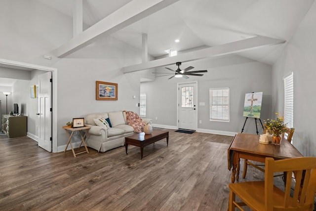 living room with baseboards, vaulted ceiling with beams, a ceiling fan, and wood finished floors